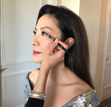 HOW MICHELLE YEOH MAKES EFFORTLESS OSCARS MAKEUP - DIOR POWDER